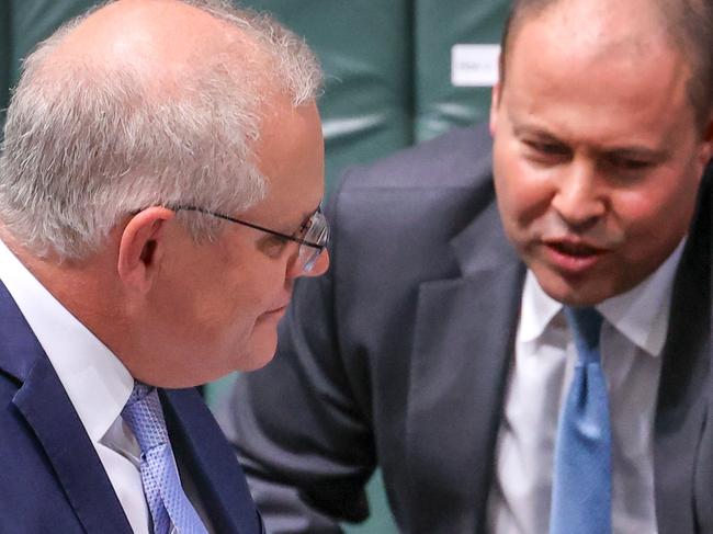 CANBERRA, AUSTRALIA - SEPTEMBER 3: Australian Prime Minister Scott Morrison talks with Treasurer Josh Frydenberg during Question Time in the House of Representatives at Parliament House on September 3, 2020 in Canberra, Australia. The federal aged care royal commission has criticised the Morrison government for failing to establish independent monitoring and reporting of aged care quality outcomes during the coronavirus pandemic.  (Photo by David Gray/Getty Images)