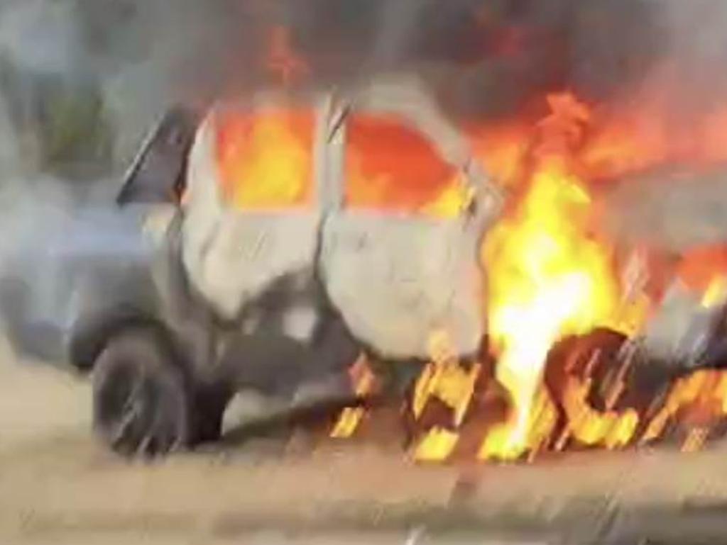 A screenshot of video footage taken of a ute ablaze on Booral Rd, Hervey Bay.