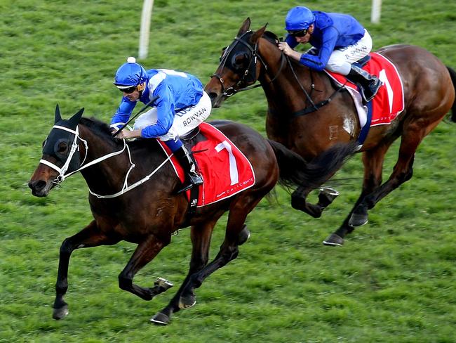 Winx, ridden by jockey Hugh Bowman, wins her 20th consecutive race at Royal Randwick. Picture: Tim Hunter