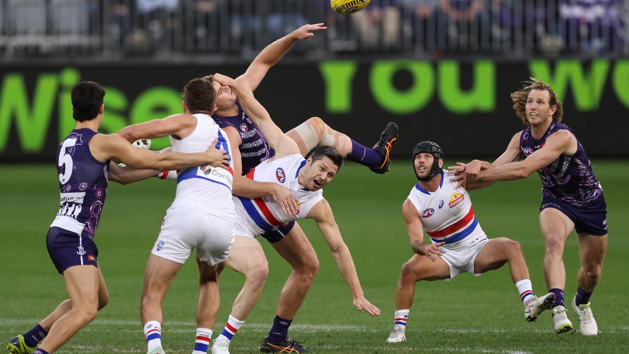 Caleb Daniel alongside Docker David Mundy at the centre bounce on Sunday. Picture: Paul Kane/Getty Images