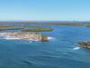 Qld’s incredible shrinking island getting smaller by the day