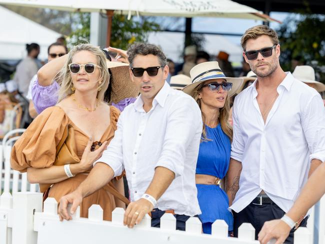 Billy Slater, Elsa Pataky and Chris Hemsworth at the Magic Millions showjumping and polo. Picture by Luke Marsden.