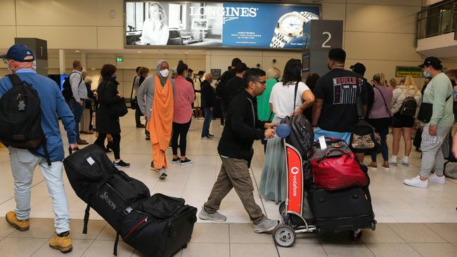 Lining up to check in luggage is becoming less popular. Picture: Gaye Gerard