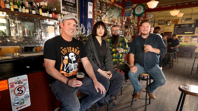 Crown &amp; Anchor proprietor Tom Skipper (left), and Crown &amp; Anchor supporter group members, Liberty Li, Dan Bogan Kirk, and Evan Morony. Picture: Dean Martin