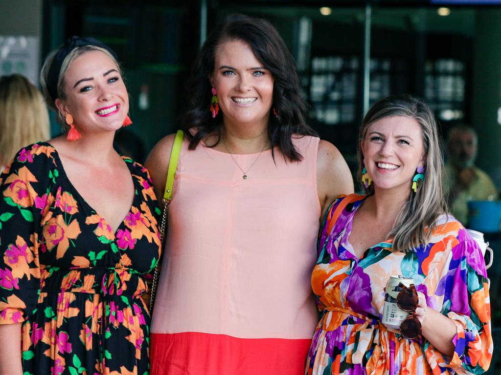 <p>Kimberley O'Brien, Jess Laurie and Megan Pearn as the Adelaide River Cup Day. Picture: Glenn Campbell</p>