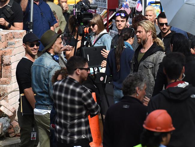 Hollywood actor Chris Hemsworth (right) chats to director Taika Waititi (left) during the filming of the movie Thor: Ragnarok in Brisbane. Picture: AAP