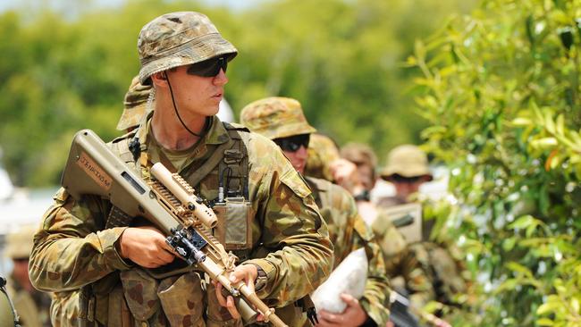 Royal Military College-Duntroon Staff Cadets perticipate in a maritime serial on Zoe Bay, Hinchinbrook Island. Staff Cadet James Jenkins disembarks back at Lucinda. Picture: Zak Simmonds