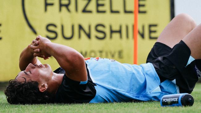 Titans rookie Sunny Kama feels the pain after a brutal yoyo test on day one of pre-season. Picture: Titans