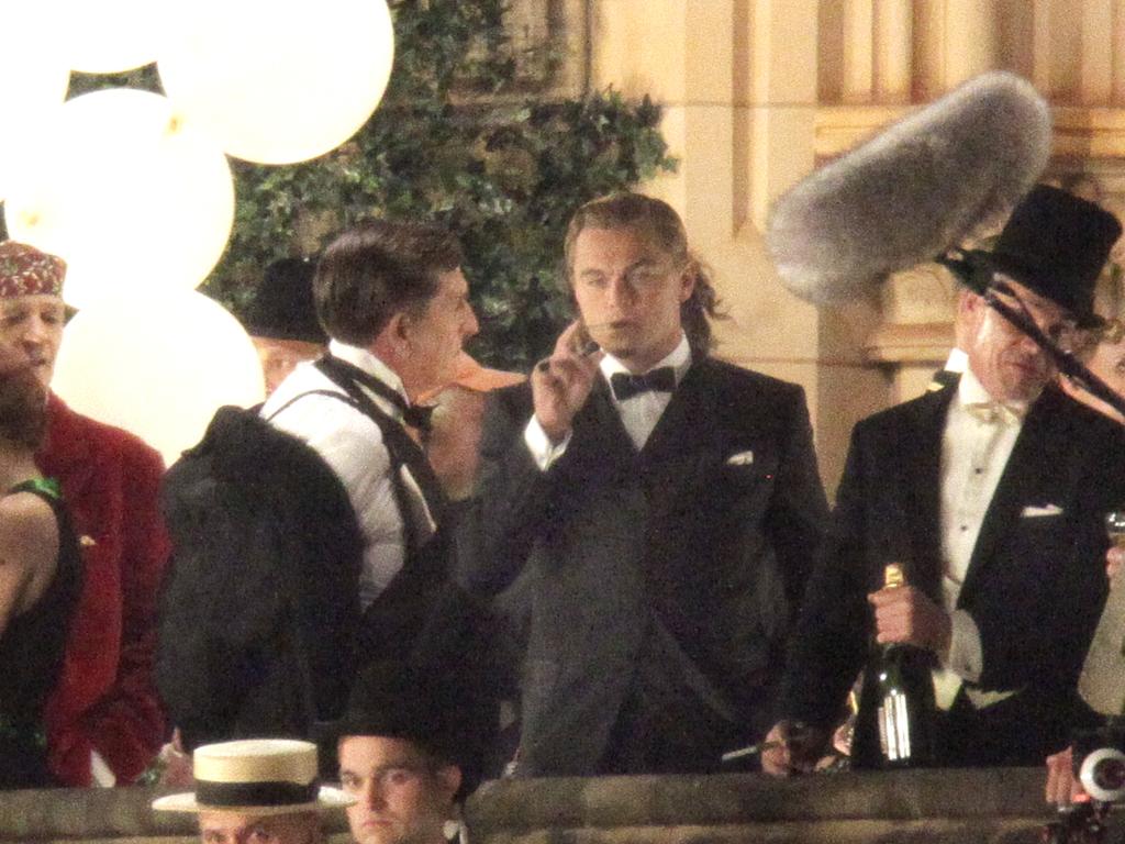 Leonardo Di Caprio (2nd R) filming a party scene for the 2013 film 'The Great Gatsby' on location at Manly in Sydney.