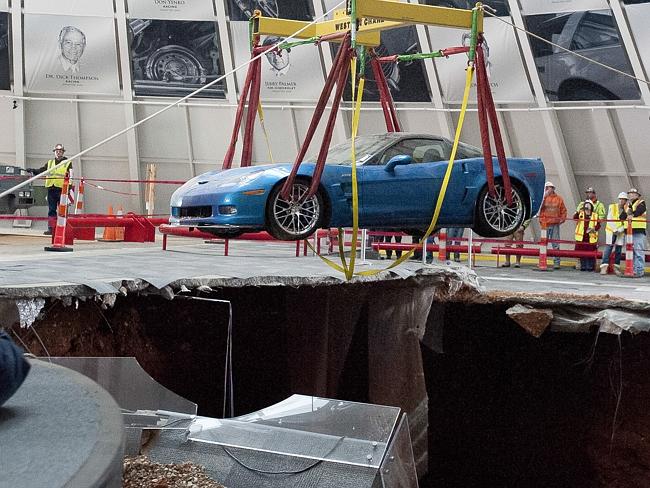 Collapse...One of eight Chevrolet Corvettes is removed from a sinkhole in the Skydome at the US National Corvette Museum in Bowling Green, Kentucky. Picture: AP