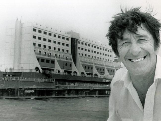 Owner of the Reef Link, Doug Tarca pictured in 1988 with John Brewer floating hotel just after it arrived on its transport ship off the John Brewer Reef.