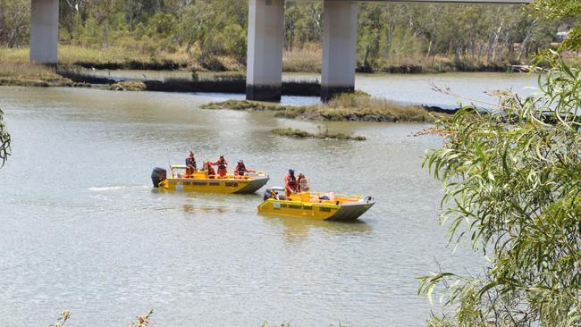 SES personnel using sonars to detect under the water.