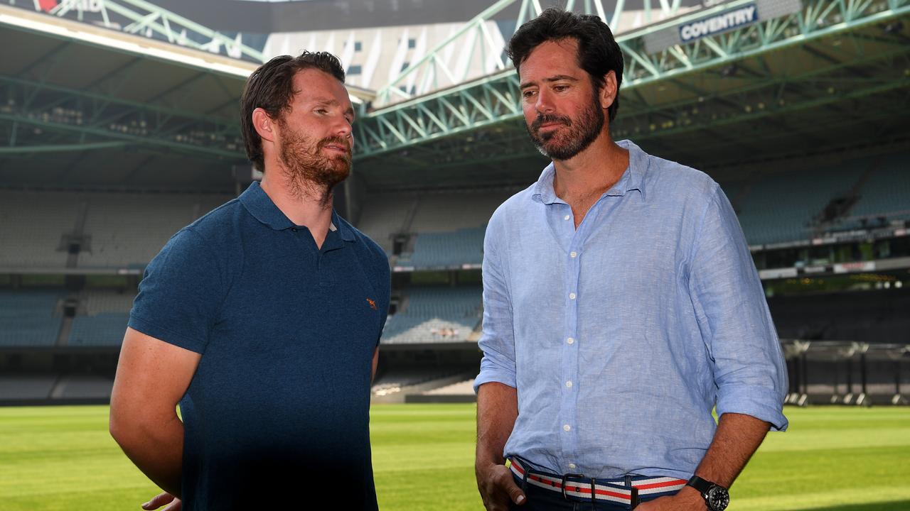 AFLPA President Patrick Dangerfield (left) and AFL CEO Gillon McLachlan. The AFL players have said they want to play Round 1 this weekend. (AAP Image/James Ross)
