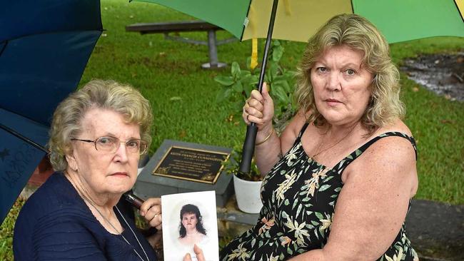 Vera Cunnington with her daughter, Janine Gilmore (right), who had hand-picked the selection of pink and purple flowers in the exact colours Dale loved in life. Picture: Patrick Woods