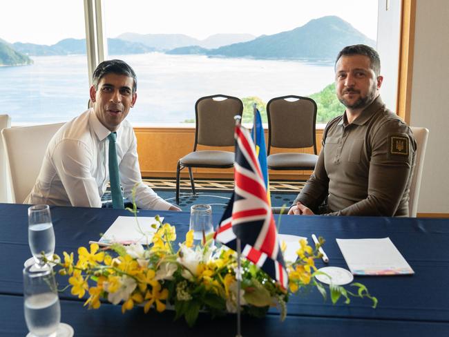 Britain's Prime Minister Rishi Sunak (left) and Ukraine's President Volodymyr Zelensky meet at the G7 Leaders' Summit in Hiroshima. Picture: Stefan Rousseau / POOL / AFP