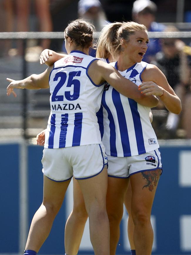 Sophie Abbatangelo of North Melbourne celebrates a goal.