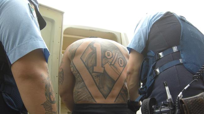 NSW Police arrest a member of the Mongols Outlaw Motorcycle Gang. Picture: NSW Police