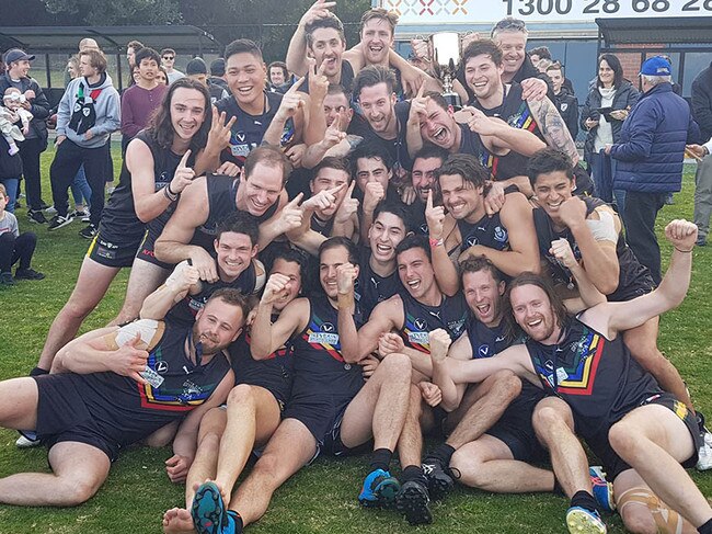 Glen Eira celebrates after winning the 2018 VAFA Division 3 premiership.