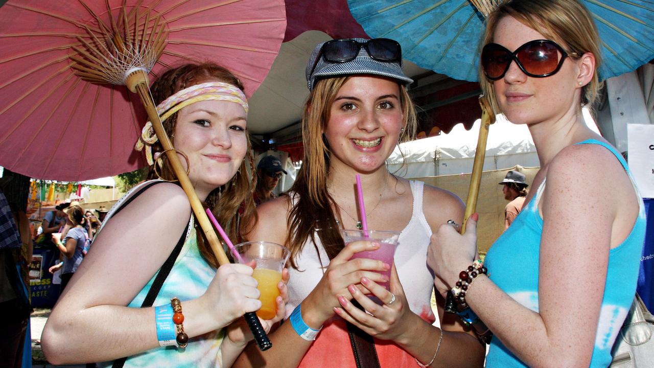 Bec Defries, Agnes Merray and Liz Maher cool down with frozen drinks at Woodford Folk Festival, 2008. Pic: Vicki Wood/Caboolture News