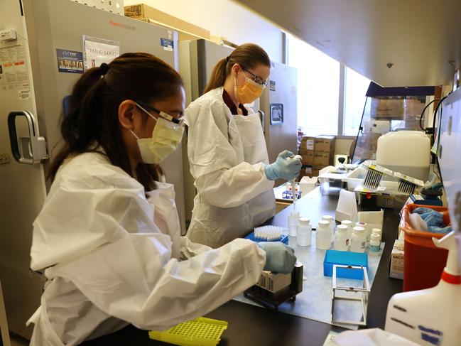 Medical lab scientists Glenda Daza and Emily Degli-Angeli work on samples collected in a Novavax Covid-19 clinical vaccine trial at the Harborview Medical Center in Seattle, Washington. Picture: Karen Ducey/Getty Images/AFP