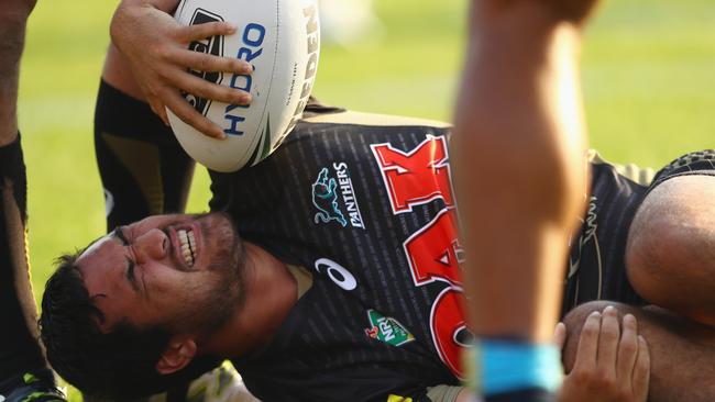 SYDNEY, AUSTRALIA - MAY 22: Peta Hiku of the Panthers grimaces as he lies on the ground with an injury during the round 11 NRL match between the Penrith Panthers and the Gold Coast Titans at Pepper Stadium on May 22, 2016 in Sydney, Australia. (Photo by Mark Kolbe/Getty Images)