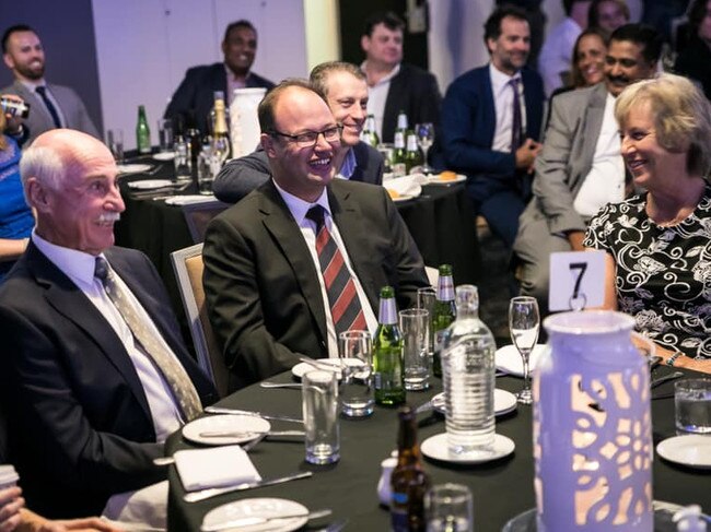 Michael 'Juice' Shepheard (centre) at the club presentation night in 2021, with his parents John and Pat, where he was made a Life Member of the club. Picture: MWDCC