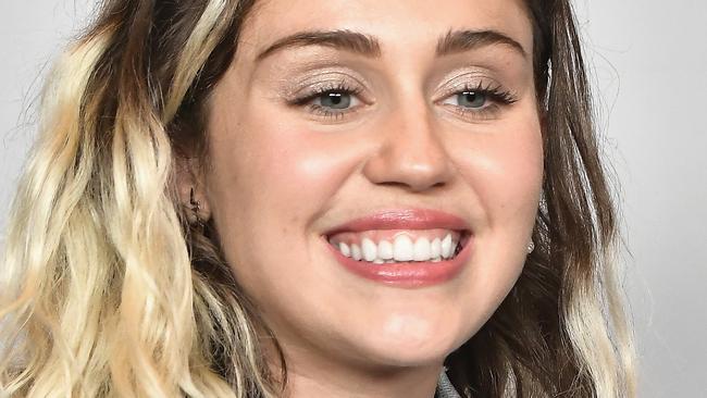 Miley Cyrus has posed in her weirdest photoshoot yet. Picture: Gustavo Caballero