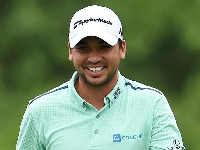 AVONDALE, LA - MAY 01: Jason Day of Australia walks down the second fairway with his caddie during a continuation of the third round of the Zurich Classic at TPC Louisiana on May 1, 2016 in Avondale, Louisiana. (Photo by Stacy Revere/Getty Images)