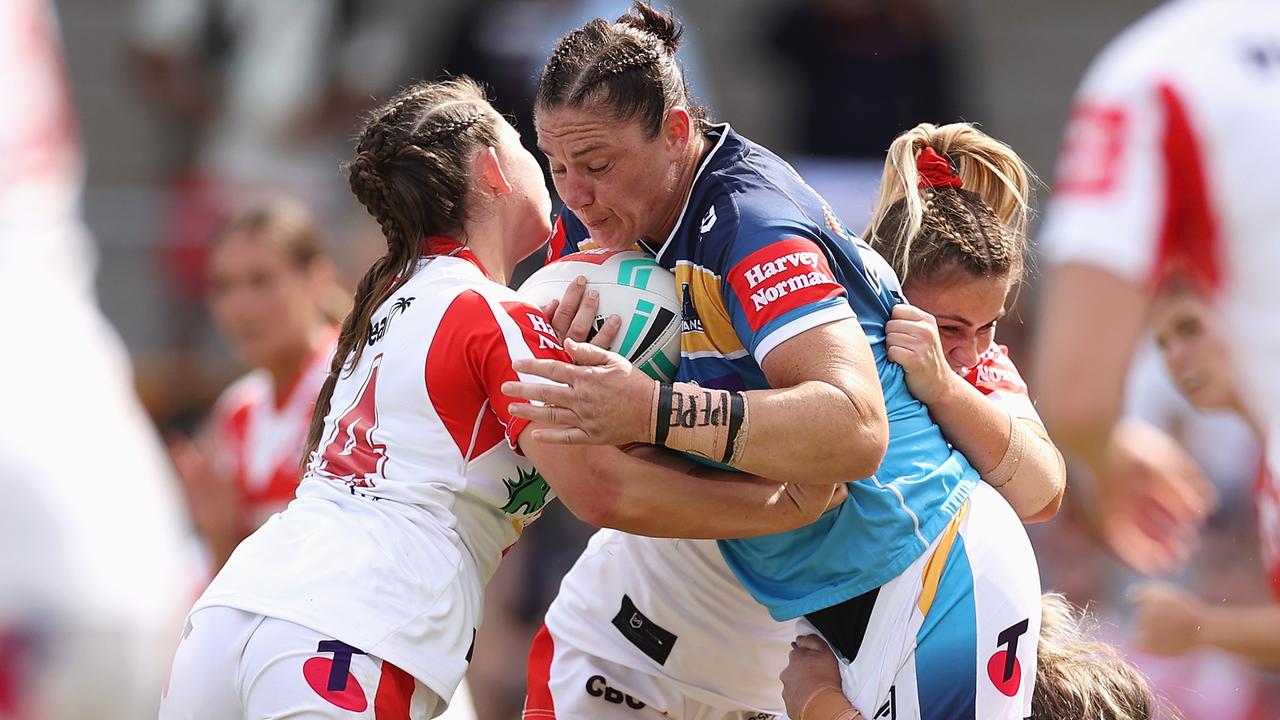 Steph Hancock charges into the Dragons defence.