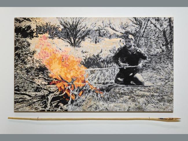 Malatja malatja (into the future) by Robert Fielding depicts his grandson Arnold Dodd, a master spear-maker. Fielding said of the piece: “This painting is not just about Arnold. It’s about all of us who came before and all who will come after. It’s about what survives – language, skill, story. He holds it with strength and grace. Through him, our culture walks boldly into the future.” Picture: Robert Fielding, Archibald 2025, Photo: Art Gallery of New South Wales, Jenni Carter