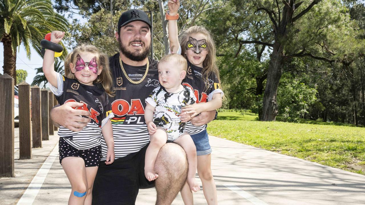 Panthers fans Joshua Placket , Amelia 6 and Harli 3 Spooky 11 months pose for a photo at Tench Reserve in Penrith. Picture:NewsWire / Monique Harmer