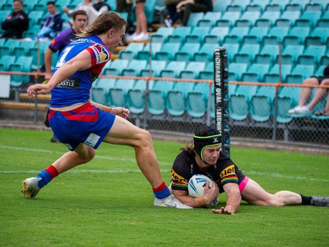 Nick Murphy crosses for a Panthers try. Picture: Thomas Lisson