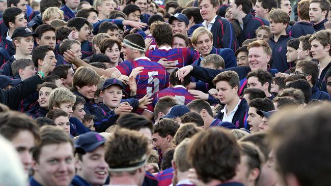 Joeys students congratulate their rugby players after a win over rivals Riverview in 2015.