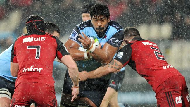 Waratahs forward Will Skelton takes on the Crusaders defence.