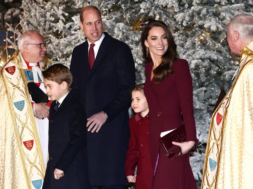 William and Kate with their children George and Charlotte at the Queen’s carols. Picture: HENRY NICHOLLS / POOL / AFP