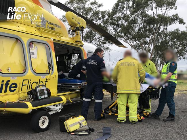 A man who was trapped in his vehicle after a horror collision on the Moonie Highway has been rushed to hospital with significant head injuries. Photo/RACQ Lifeflight