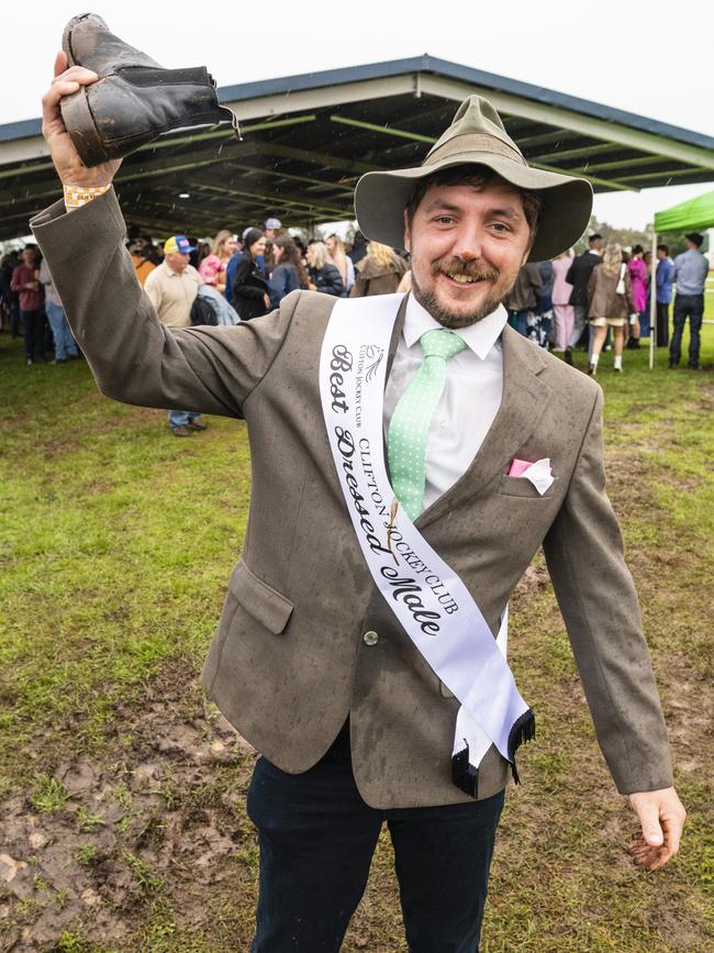 Winner of Best Dressed Male Sam Glasheen celebrated his win with a shoey at the Clifton Cup races hosted by Clifton Jockey Club, Saturday, October 22, 2022. Picture: Kevin Farmer