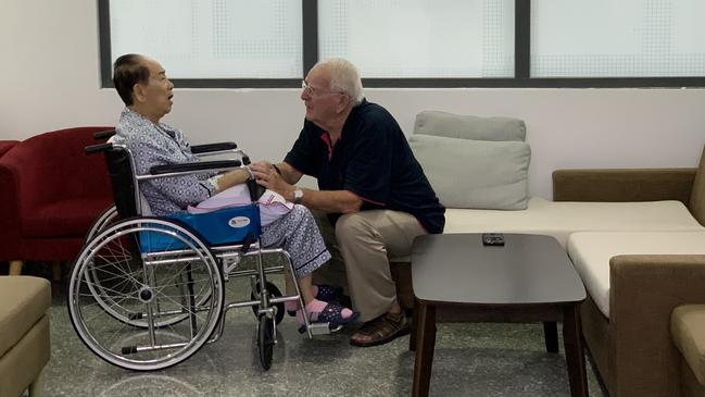 With Nghe in the hospital at Can Tho after his stroke. Picture: Supplied