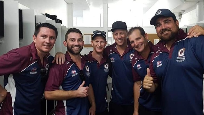 Broadbeach Cats AFL master Andrew Schumacher (right).