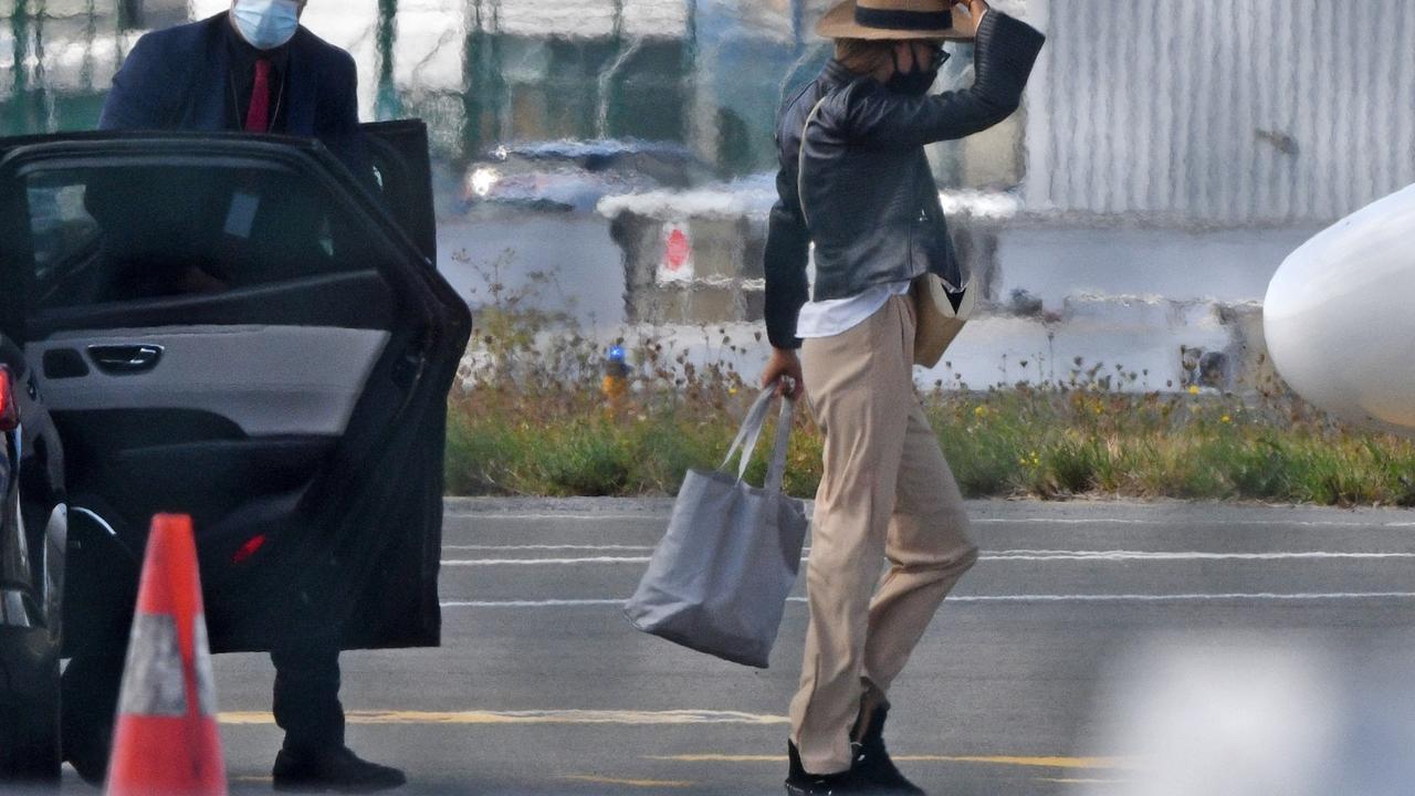 Nicole was dressed casually and both wore face masks and hats as they headed to a private jet taking them on romantic trip to the south of France. Picture: BACKGRID