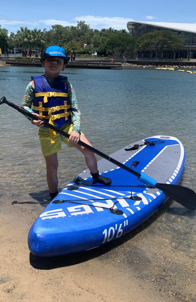 Damian McDonnell went paddle-boarding at the Darwin Waterfront to beat the heat. Picture: Sierra Haigh