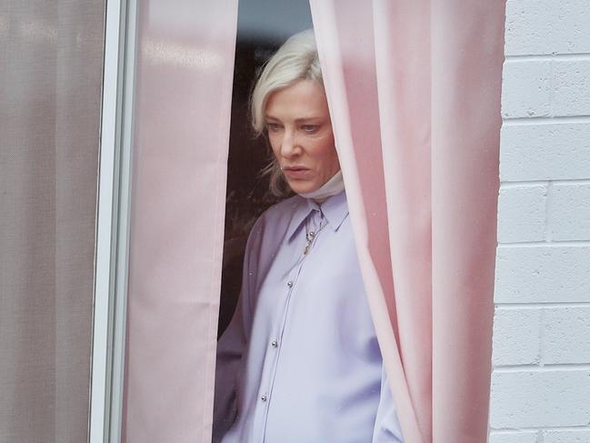 31.5.2019.Filming of new mini series 'Stateless' at The Arts Theatre on Angas St, Adelaide.Cate Blanchett  peering out of the Arts Theatre window.  PIC TAIT SCHMAAL.