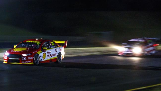 Fabian Coulthard (L) during night testing at Sydney Motorsport Park. Pictures: Mark Horsbrough