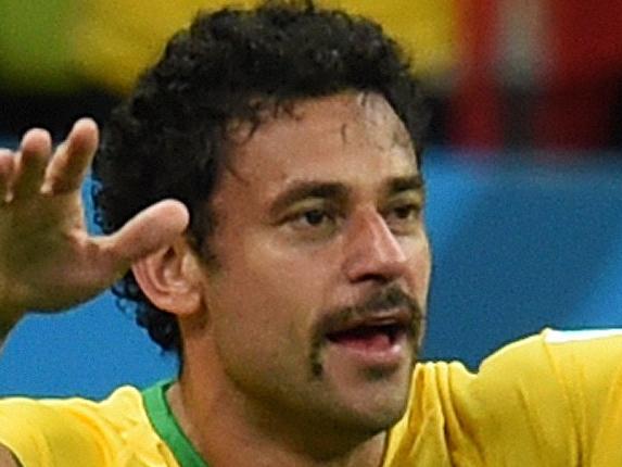 Brazil's forward Fred celebrates after scoring during a Group A football match between Cameroon and Brazil at the Mane Garrincha National Stadium in Brasilia during the 2014 FIFA World Cup on June 23, 2014. AFP PHOTO / PEDRO UGARTE