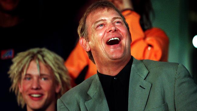 John Farnham in Melbourne in April of 1999 for the launch of his 50th birthday tour, with son Robert in background. Picture: John Feder.