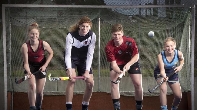 Stella Pritchard (Diamondbacks), Magnus McCausland (Derwent), Oliver Pritchard (Diamondbacks) and Lucy McMullen (NWG) at New Town. Picture Chris Kidd