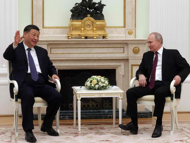 Russian President Vladimir Putin meets with China's President Xi Jinping at the Kremlin in Moscow on March 20, 2023. (Photo by Sergei KARPUKHIN / SPUTNIK / AFP)