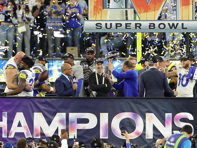 INGLEWOOD, CALIFORNIA - FEBRUARY 13: Head coach Sean McVay of the Los Angeles Rams  holds up the Vince Lombardi Trophy  after Super Bowl LVI at SoFi Stadium on February 13, 2022 in Inglewood, California. The Los Angeles Rams defeated the Cincinnati Bengals 23-20.  (Photo by Rob Carr/Getty Images)