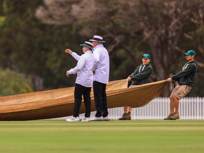 SYDNEY, AUSTRALIA - OCTOBER 08: The covers come on as rain delays play during the Sheffield Shield match between New South Wales and South Australia at Cricket Central, on October 08, 2024, in Sydney, Australia. (Photo by Mark Evans/Getty Images)