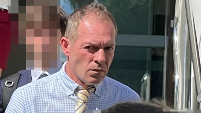 Milos Dobre, 48, pleaded guilty plea to using intimidation or violence to unlawfully influence a person in January and was sentenced in Wollongong Local Court on Friday. Pictured with his lawyer. Picture: Ashleigh Tullis